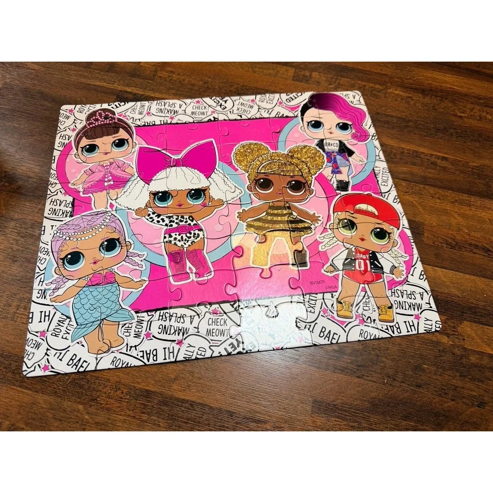 LOL Surprise lunch tin box with 48 piece puzzle inside.